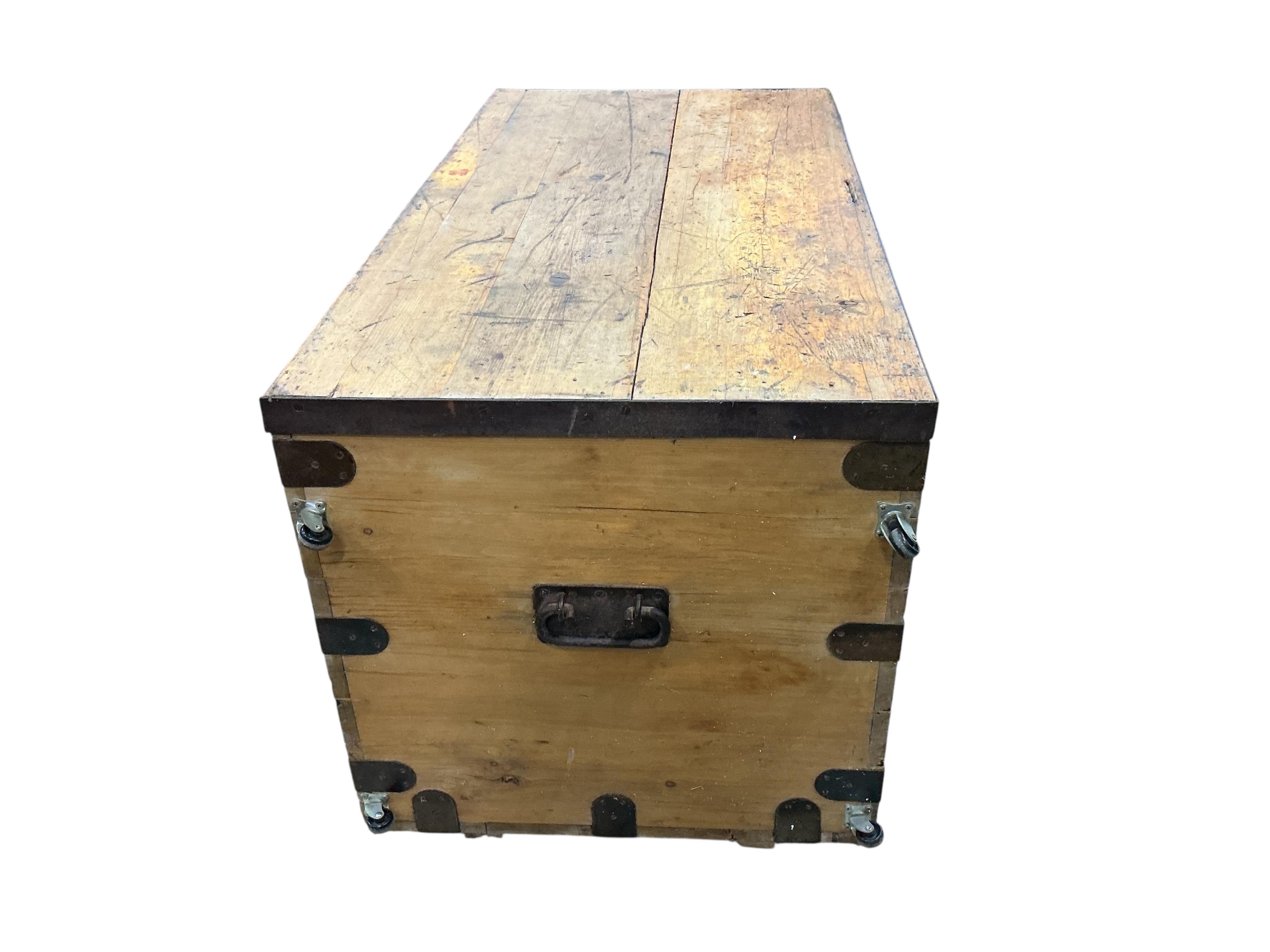 A large iron bound pine trunk, width 120cn, depth 61cm, height 61cm